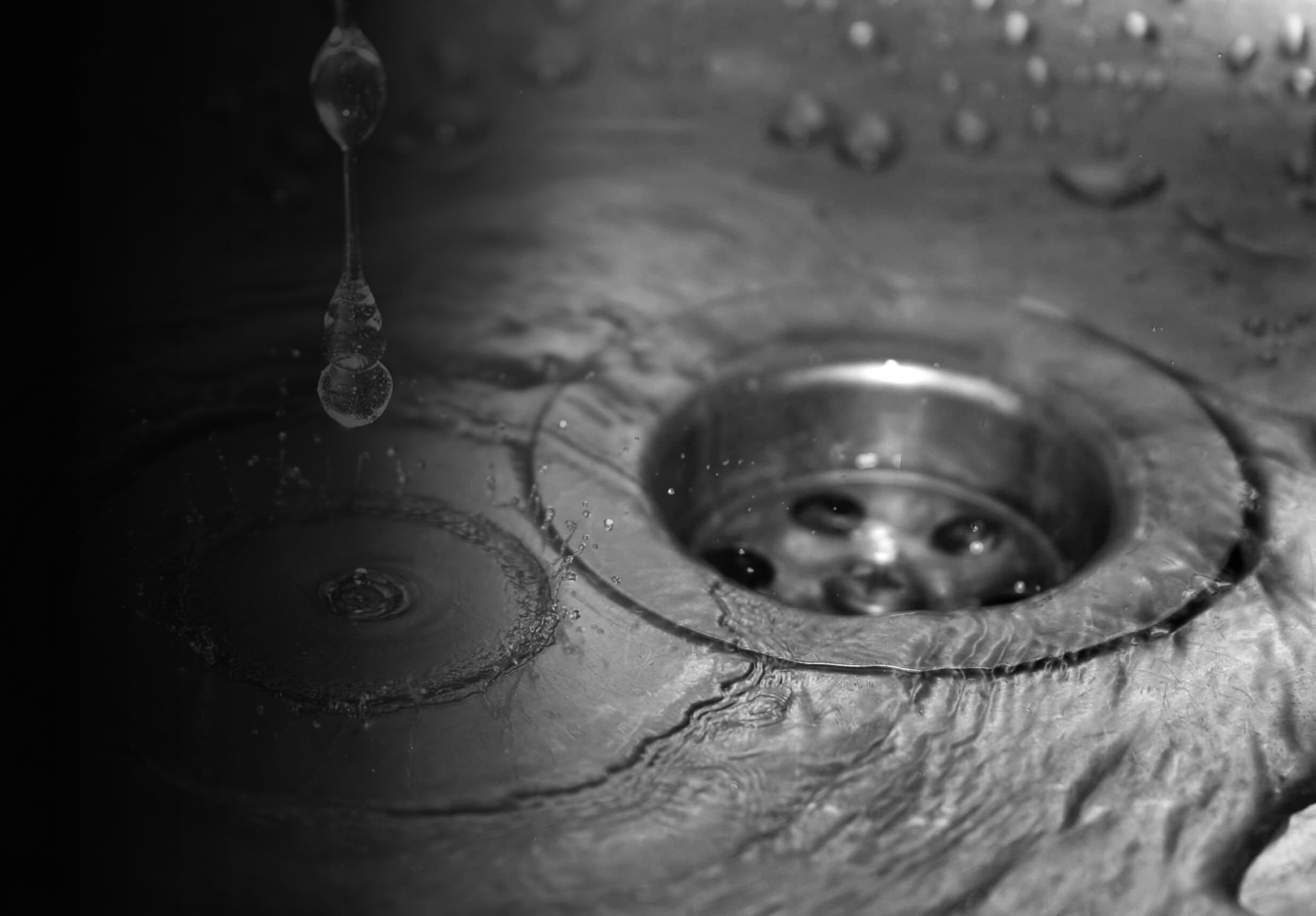 water draining down a sink